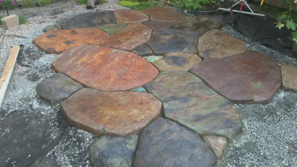Irregular flagstone path in orange, rust and grey