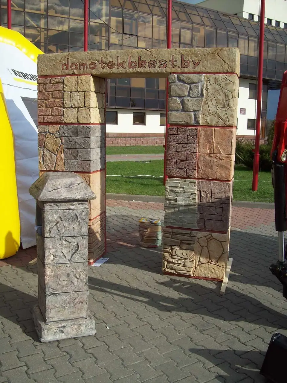 The stone gateway and pillar on the paving