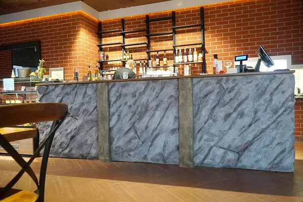 The full length of the counter from the café floor