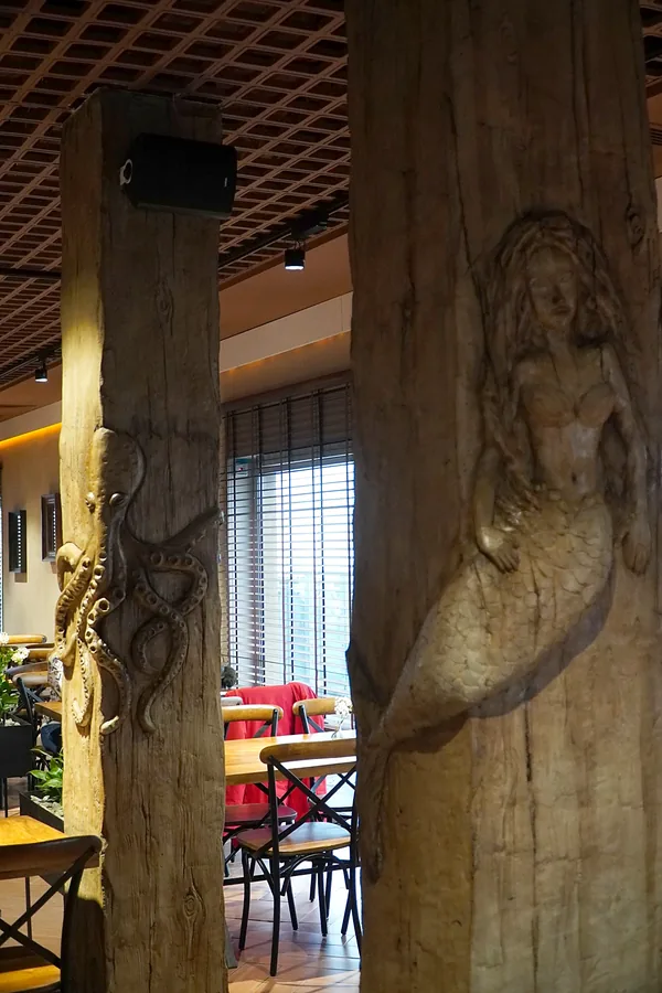 Octopus and mermaid columns side by side