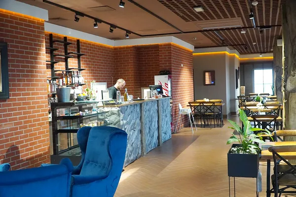 Bar counter and brick walls of the café