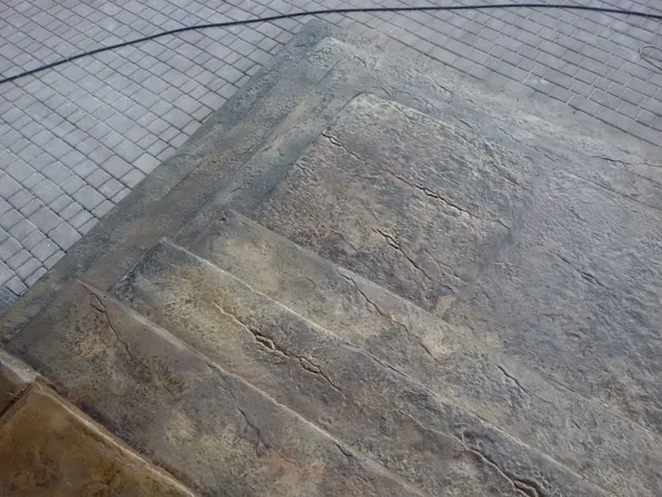 The steps from above, turning onto the paving