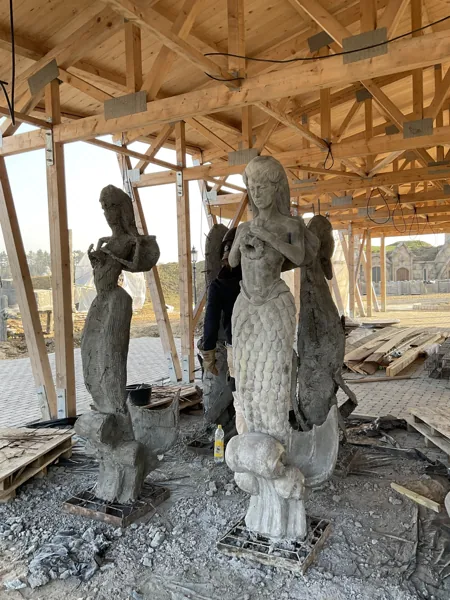 The same mermaids a few days later, modelled in mortar